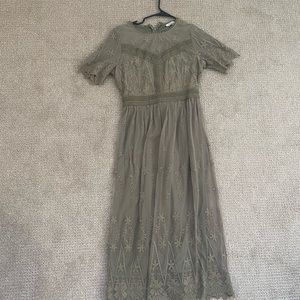New with tags!! Pretty olive lace midi-dress.